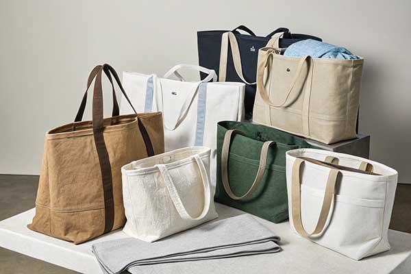 A collection of diverse tote bags in different colors and materials, showcasing versatility and style.