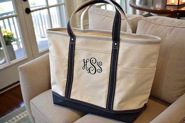 a boat tote bag with a custom logo