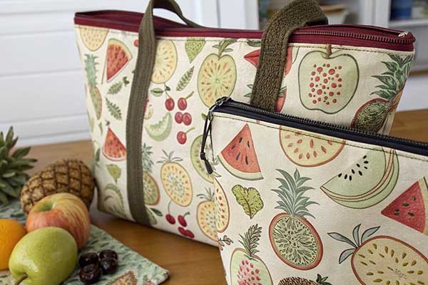 A close-up shot of a tote bag and a cosmetic pouch