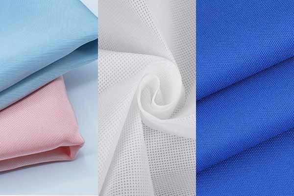 From left to right, the three fabrics in the picture are Oxford cloth, non-woven fabric, and RPET cloth. Oxford cloth is known for its durability and is commonly used in bags and clothing. Non-woven fabric is a versatile material with applications in hygiene products and packaging due to its convenience in production. RPET cloth is an environmentally friendly fabric made from recycled PET materials, contributing to sustainable practices in the textile industry.