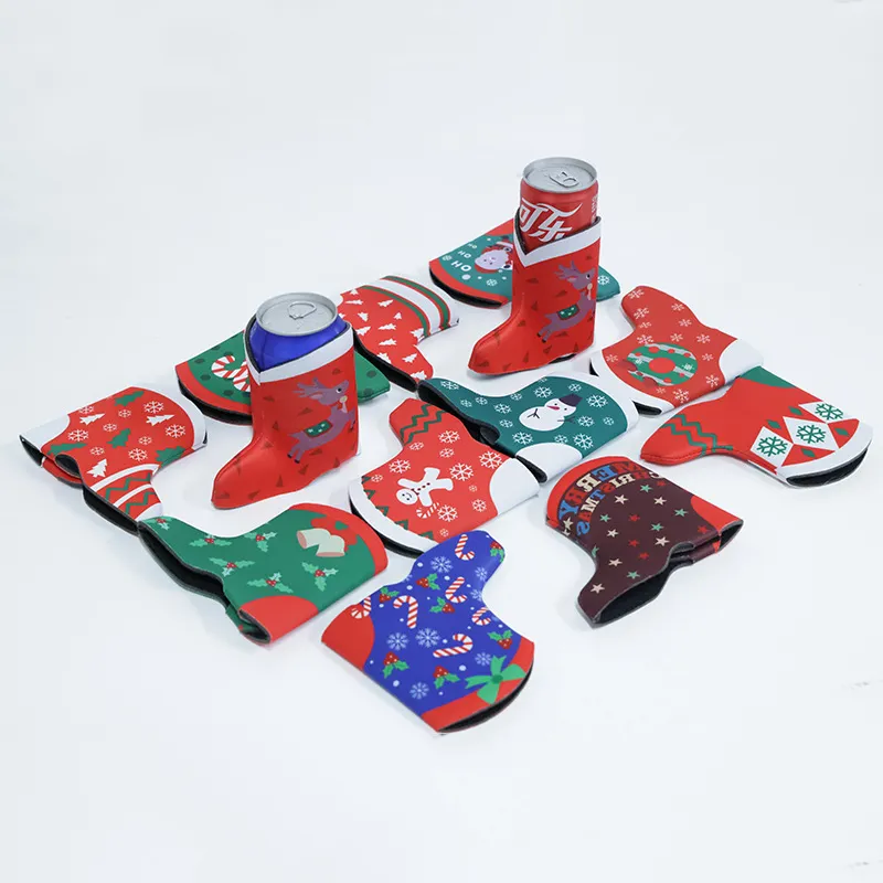 A collection of festive boot-shaped beer can sleeves with different Christmas designs, including reindeer, snowflakes, and candy canes