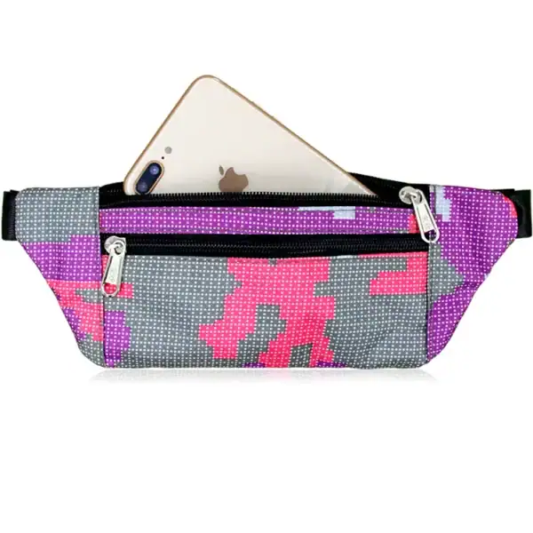 A waist bag with pink and purple pixel camouflage pattern featuring a front zipper pocket and holding a smartphone.