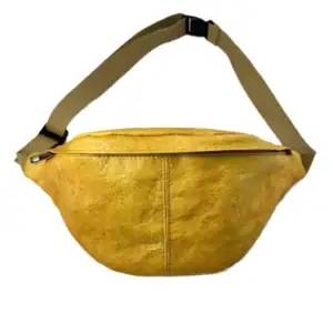 A compact, stylish yellow fanny pack with adjustable strap and front zip closure.