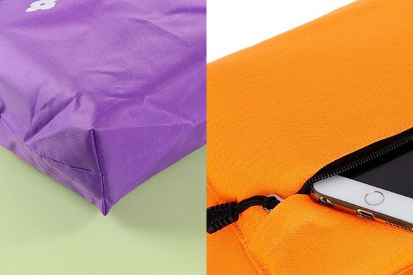 Two bags of different thicknesses. The thin purple one is a foldable shopping bag, and the thick orange one (with a phone in its zippered pocket) is for uses like backpacks.