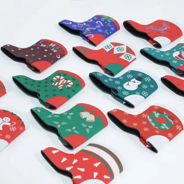 A collection of colorful Christmas-themed bag accessories with festive designs.