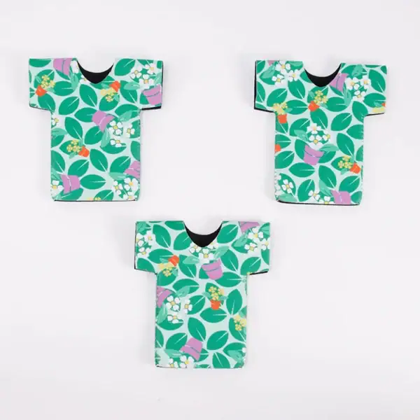 Three colorful t-shirt-shaped reusable bags with floral designs on a white background.