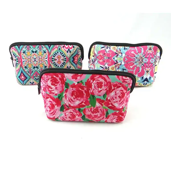 Colorful cosmetic bags with floral and geometric designs, perfect for stylish organization.