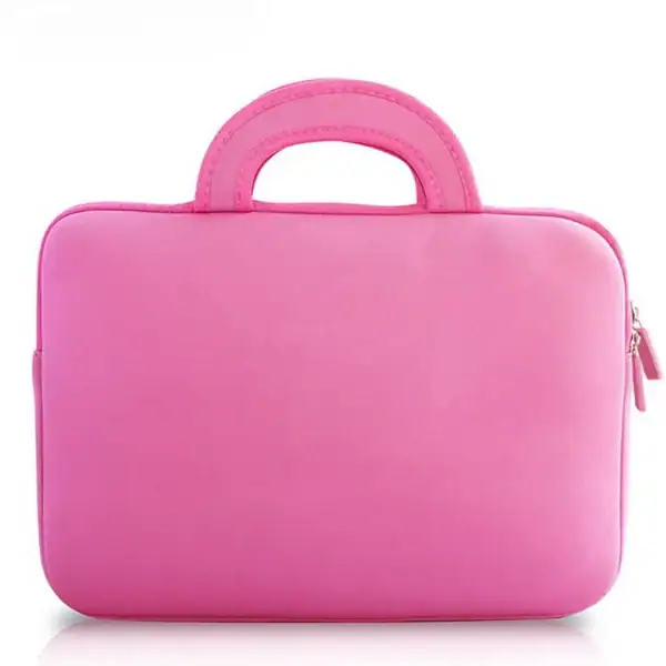 A stylish pink laptop bag with handles and a smooth finish, ideal for carrying devices.