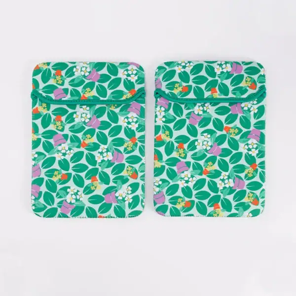 Colorful reusable drawstring bags with floral pattern for eco-friendly storage.