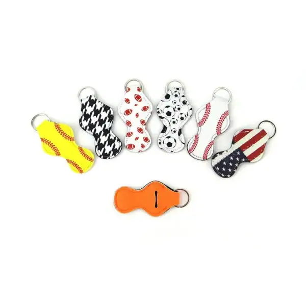A collection of colorful sports-themed keychains featuring various patterns and designs.