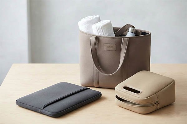 Neoprene bag collection on table