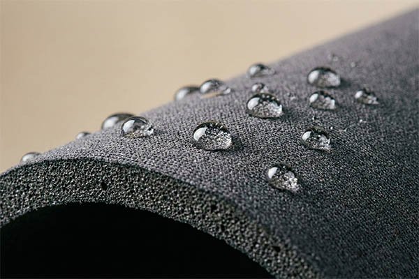 Water droplets on neoprene fabric