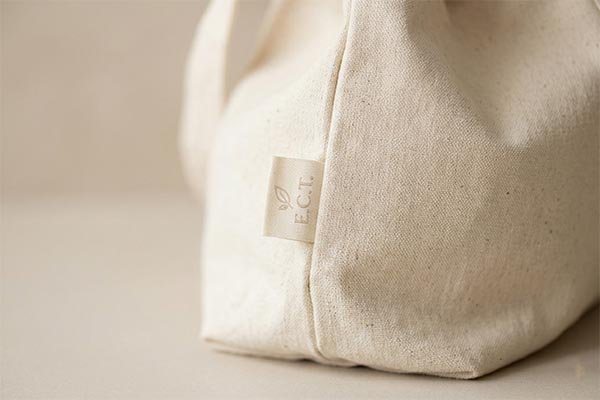 subtle brand label on tote bag